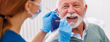 Patient smiles at dentist