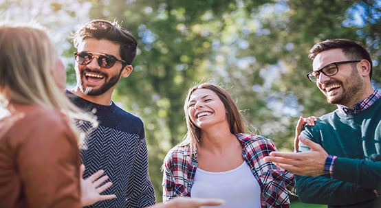 group of people smiling and laughing